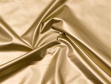 gold metallic vinyl fabric|fabric with gold metallic threads.